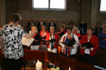 Koor met inval dirigente Charlotte. 