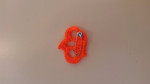 Oranje kroontje voor op jas 